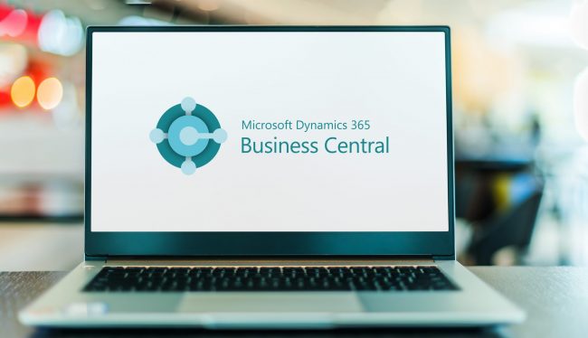 Laptop showing logo of Microsoft Dynamics 365 Business Central Ein Notebook auf dem das Microsoft BC Logo zu sehen ist